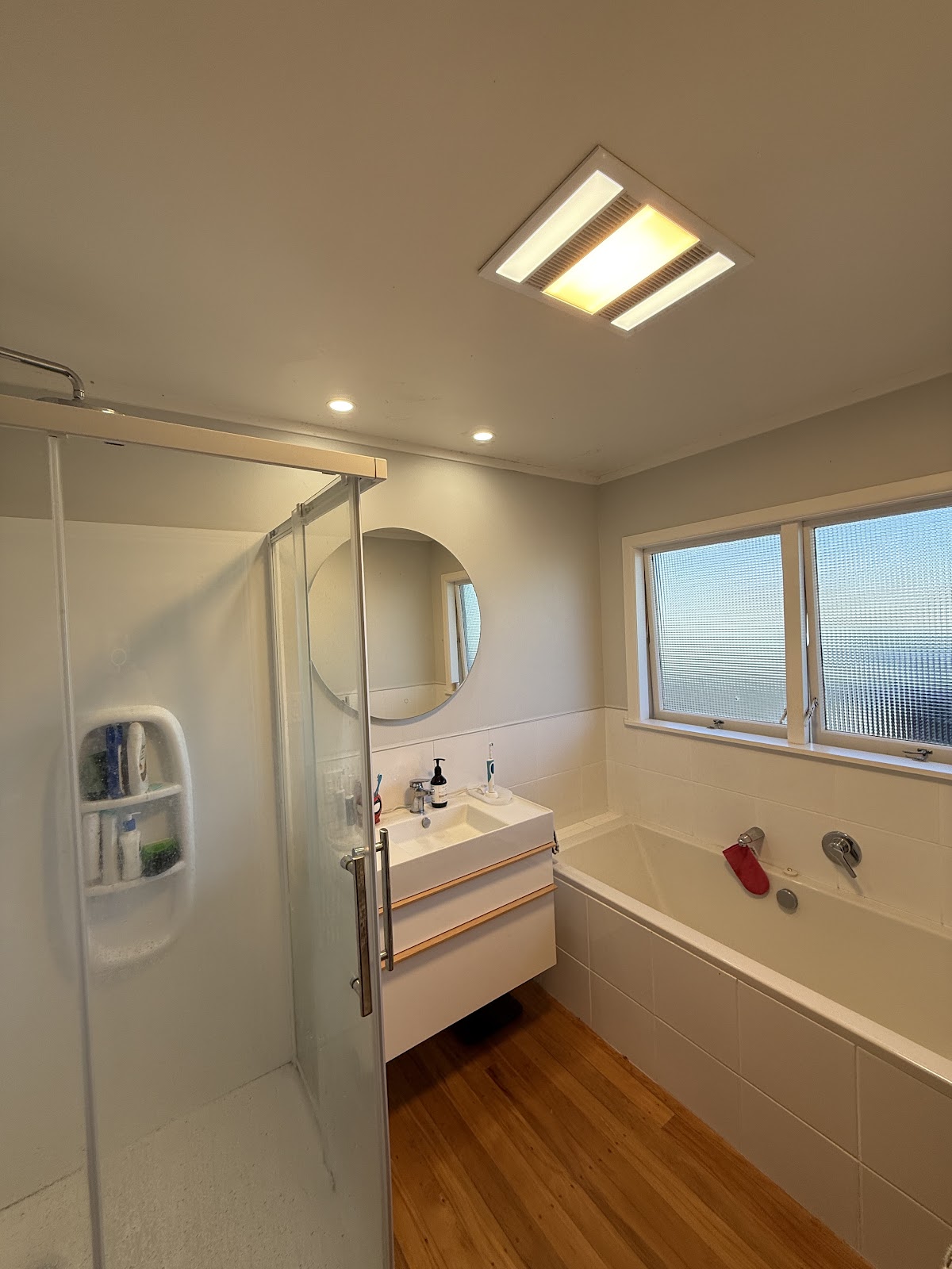 Bathroom heat, light and ventilation ceiling unit with downlights