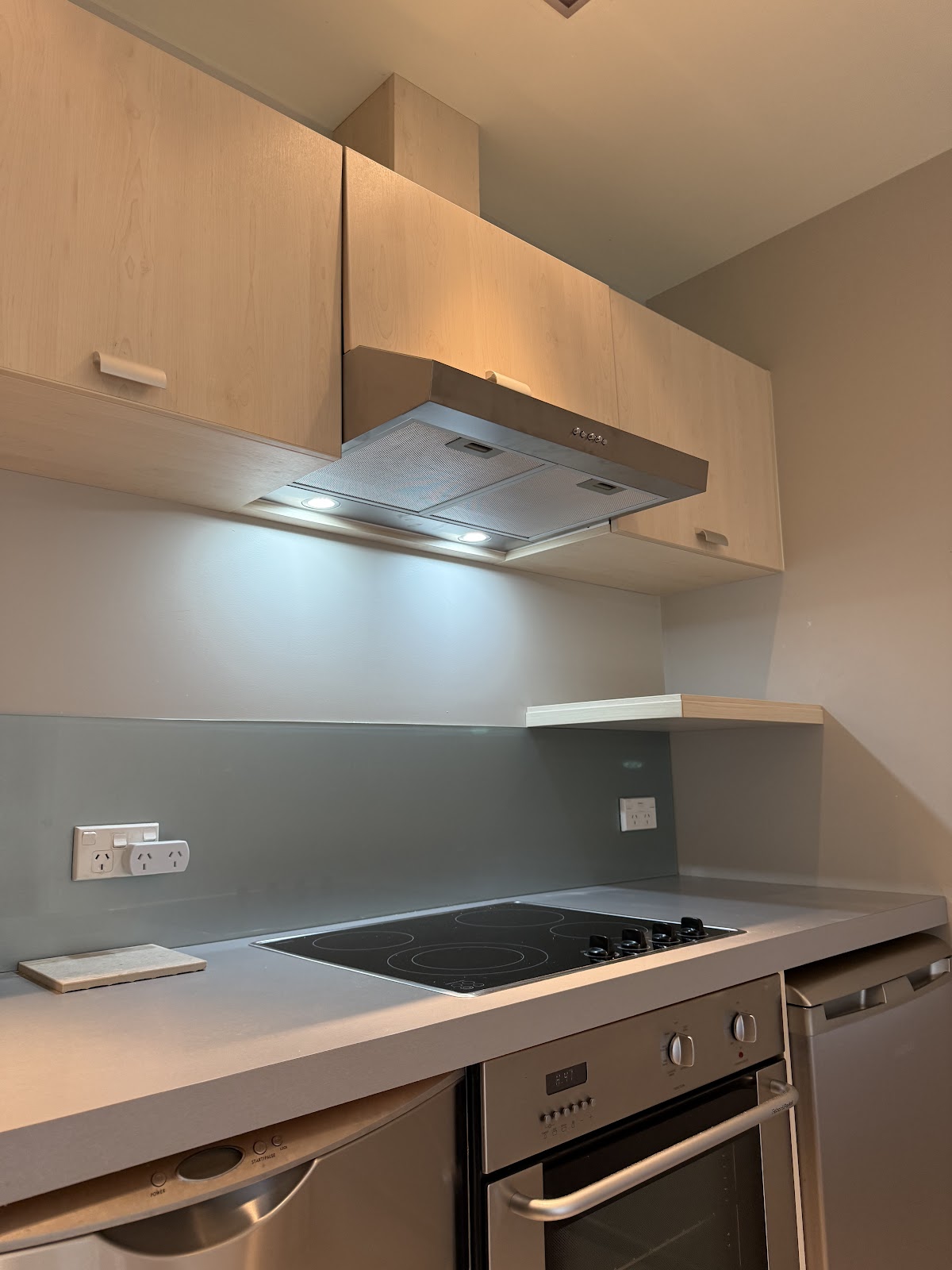 Kitchen electrical work by So Watt Electrical with rangehood, cooktop and under cabinet lighting